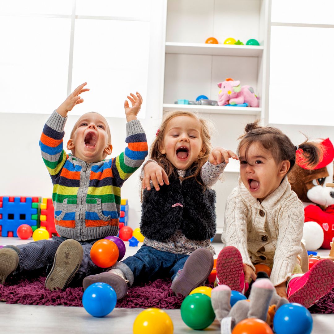 smiling children playing at daycare