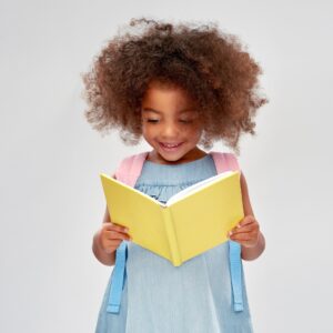 Young girl reading a book