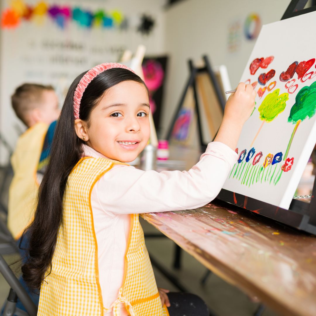 child painting picture