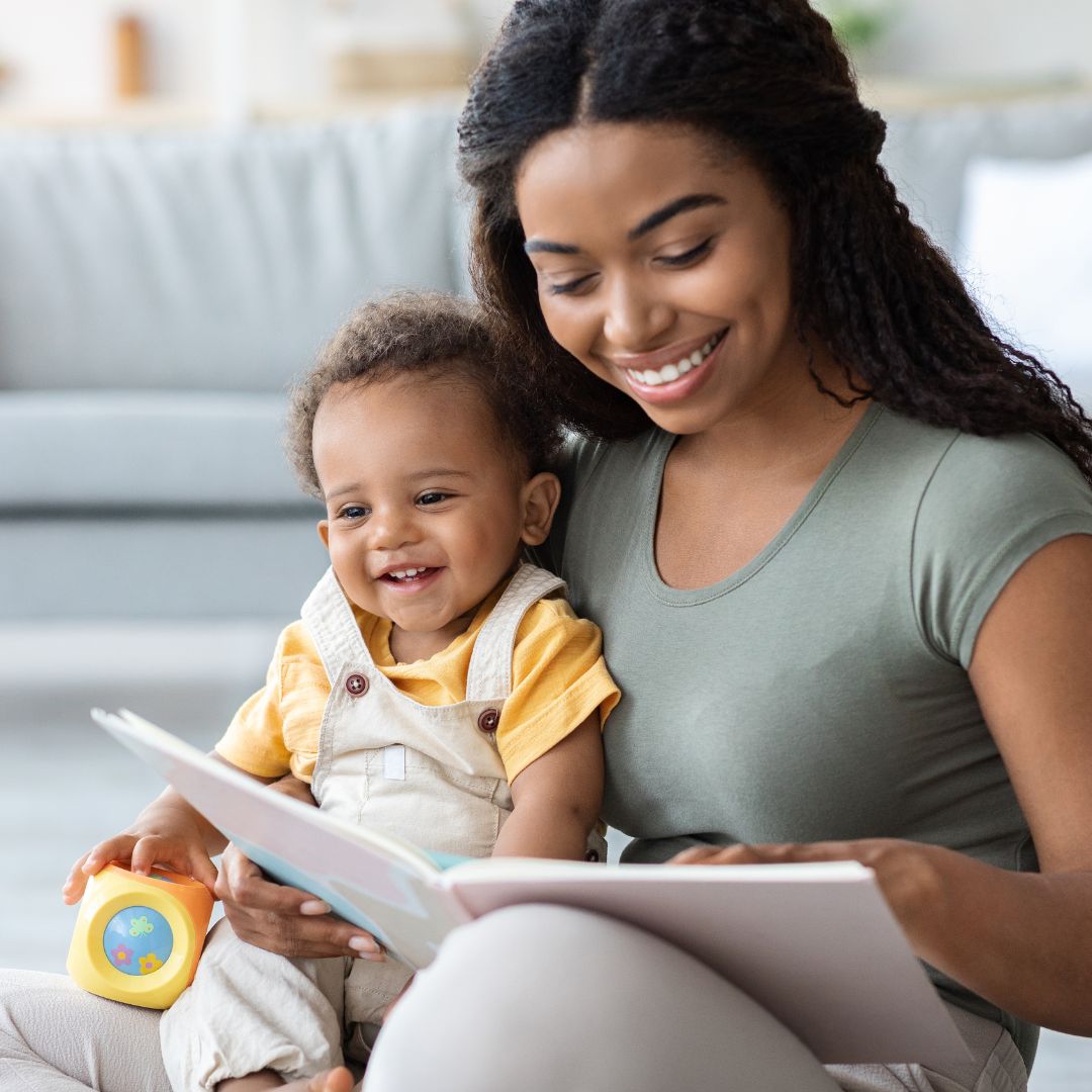 caregiver reading to infant