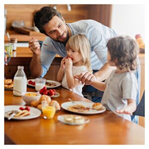 Family eats breakfast