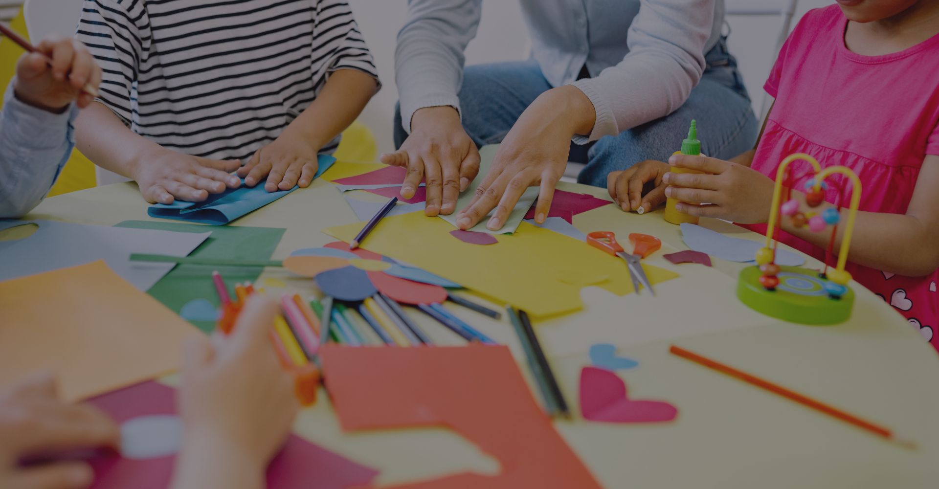 preschoolers working on crafts