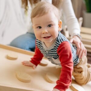 Infant smiling at daycare.