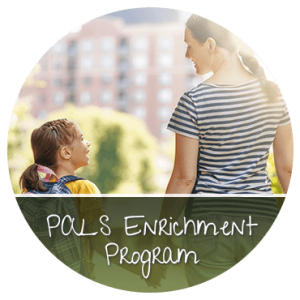 Adult and child walking together